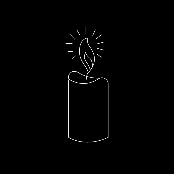 Trauer: Kerze auf schwarzem Hintergrund